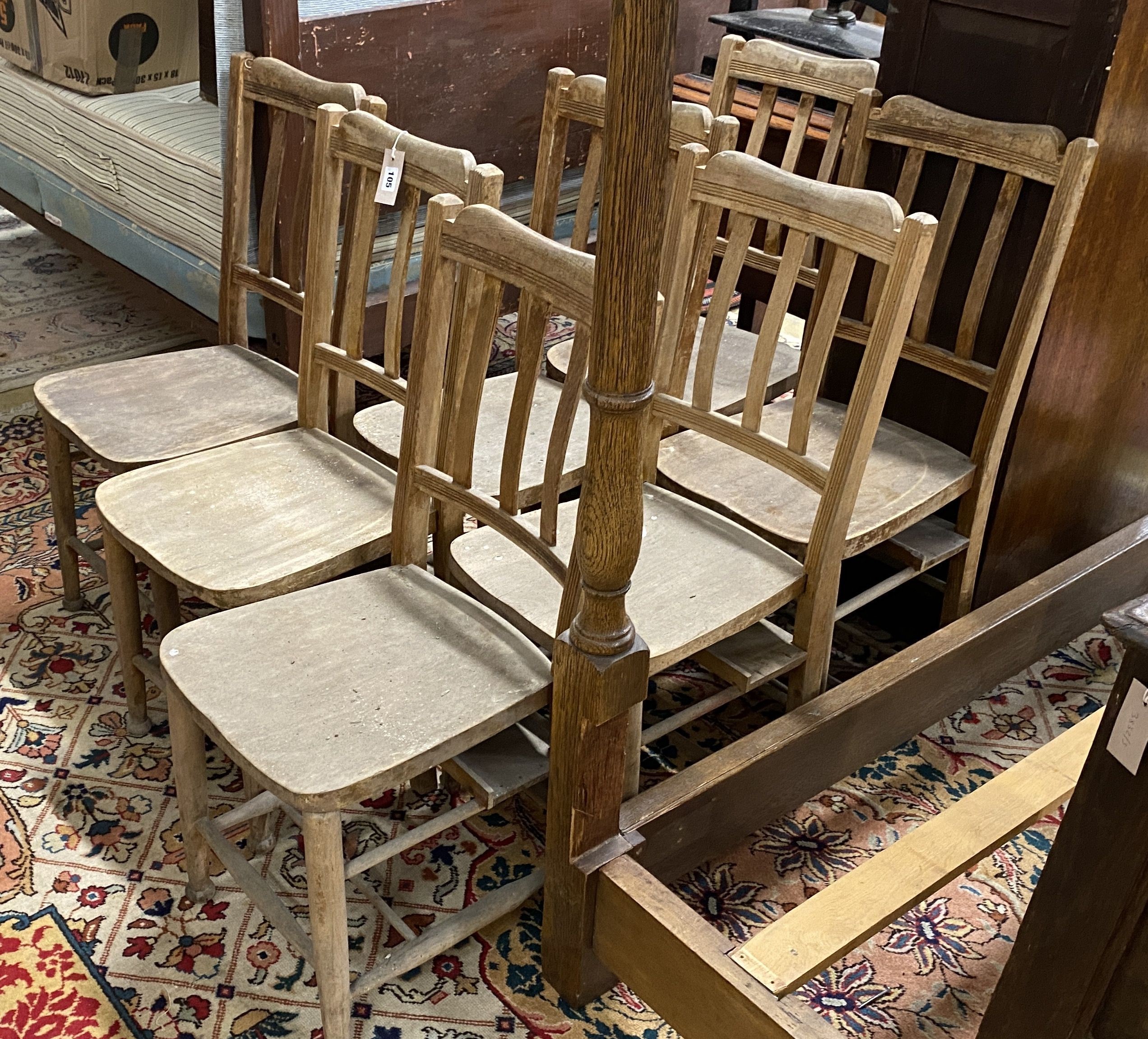 A set of seven beech chapel chairs